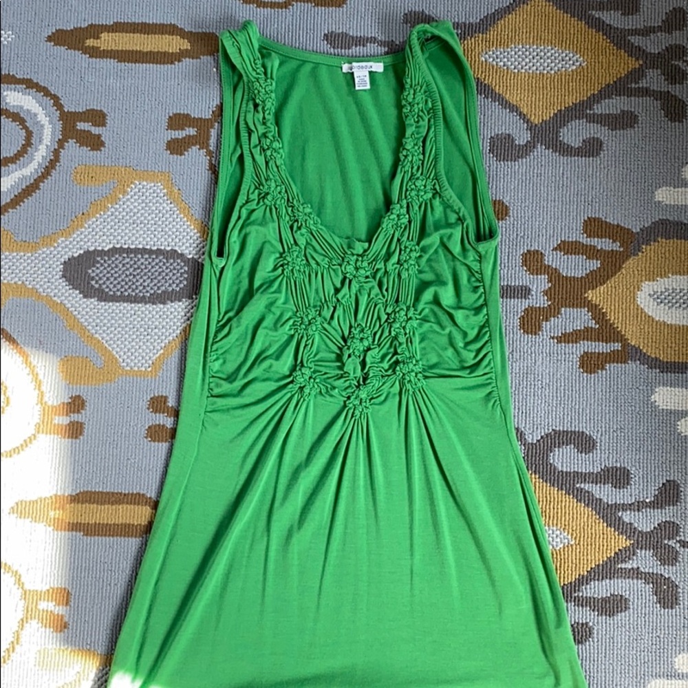 Sleeveless stretch green top with detailed front